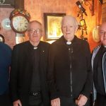 KERRY: The annual Mass for Manor Village residents was recently celebrated by Canon JamesLinnane, sitting centre of seat. The O’Shea brothers supplied the music, and refreshments were served by the community. Photo: John Cleary