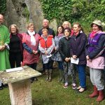 Clare: Bishop Fintan Monahan pictured with members of the local Kildysart Choir at the annual pilgrimage to Canons' Island for Mass at the monastery ruins.