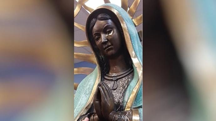 Crowds gather for alleged  crying Virgin Mary statue