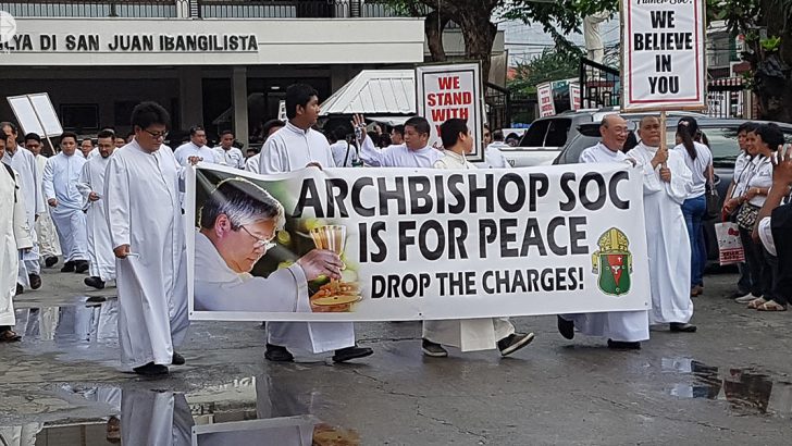 Thousands march to defend Philippines clergy