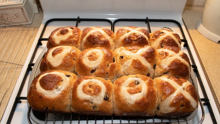 Sumptuous cinnamon-coated hot cross buns: an Easter treat