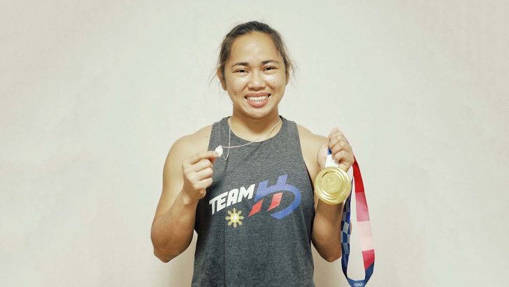 Champion weightlifter’s faith inspires her homeland