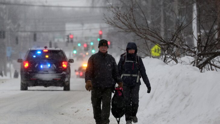 Priest weathers Christmas blizzard on fireboat celebrating Mass for two