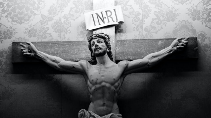 Who is condemned and why do Catholics wear crucifixes?