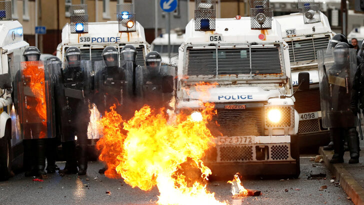 Priest appeals for calm as violent protests grip UK