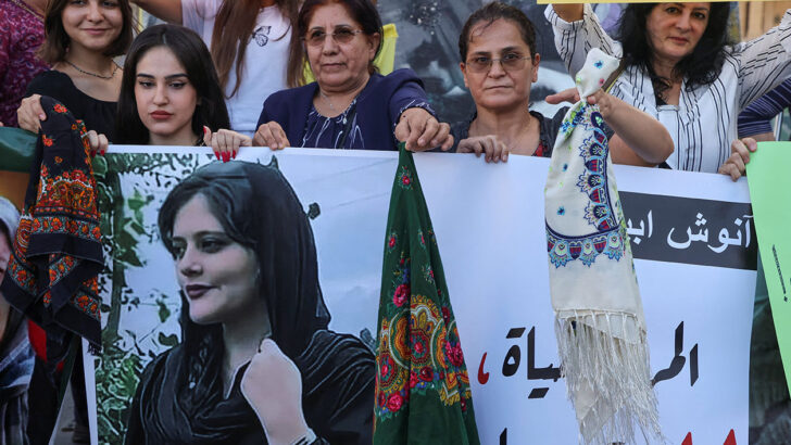 Women and men walking side by side for peace, justice and equality